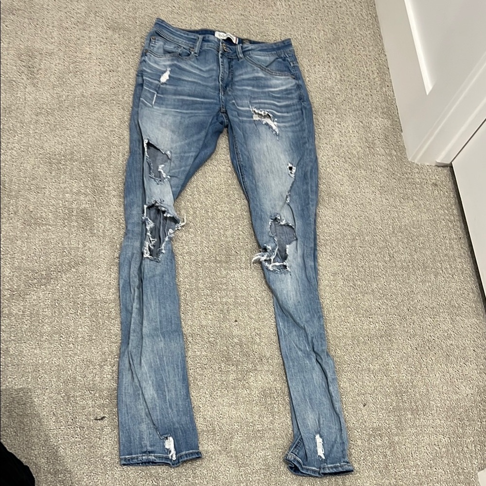Distressed Blue Jeans